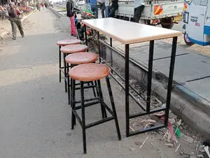 Four Mahogany Stools With One MDF Table