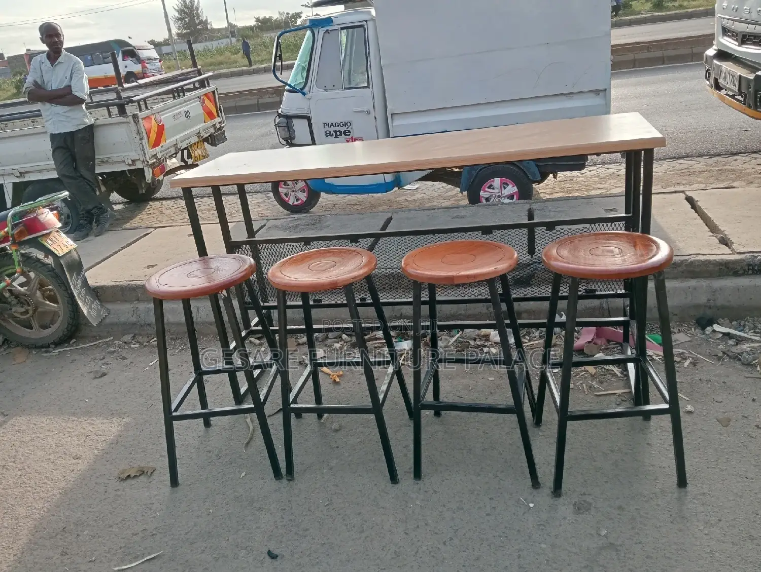 Four Mahogany Stools With One MDF Table