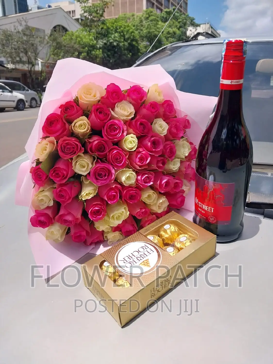 Red Wine With Pink and White Roses