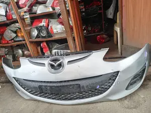 Mazda Demio 2010-2012 Front Bumper With Both Grills Cove