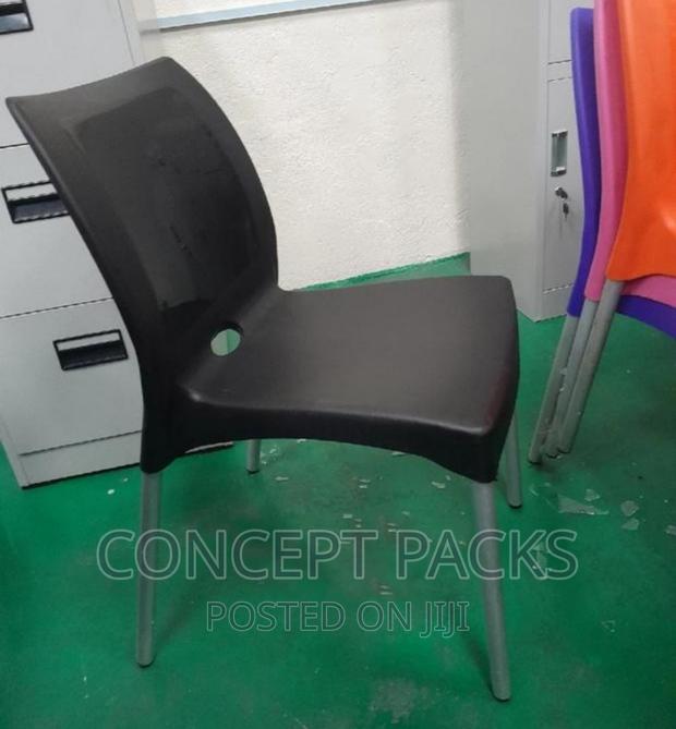 Complast Black Plastic Armless Chair. - main view