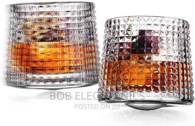 A Set of 6 Wobbly Rotating Whiskey Glasses