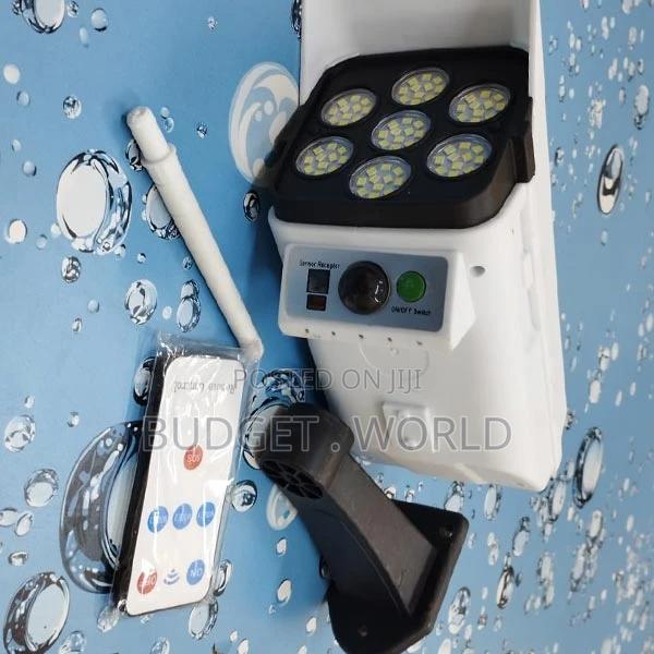Solar Powered Simulated Dummy Security Camera''