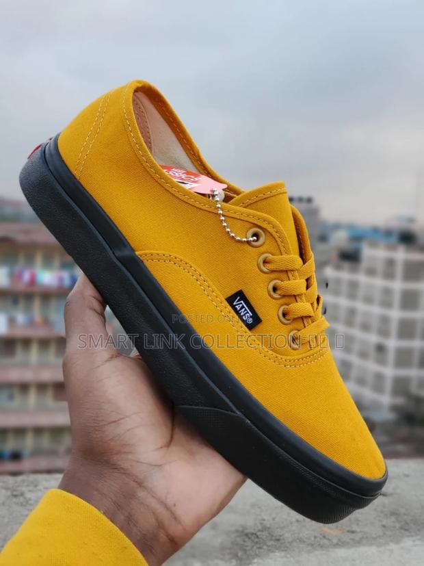 Blue/ Mattered Yellow Vans