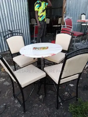 4 Hotel/ Bar Chairs With One Table