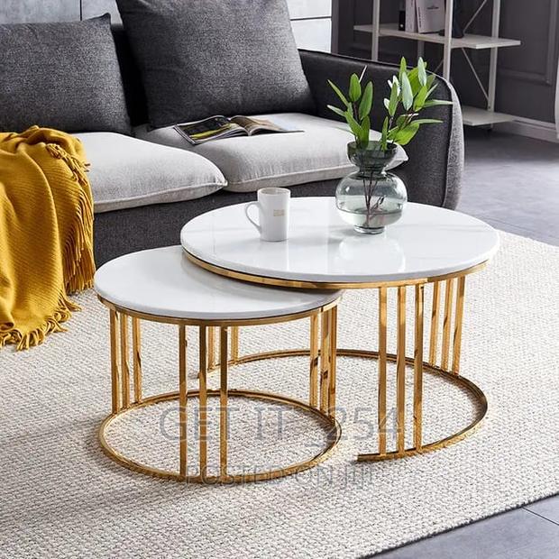 Now Restocked: PURE MARBLE Nesting Table With Gold Reinfo - main view