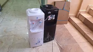 Two Tap Black Hot and Normal Rashnik Water Dispenser.