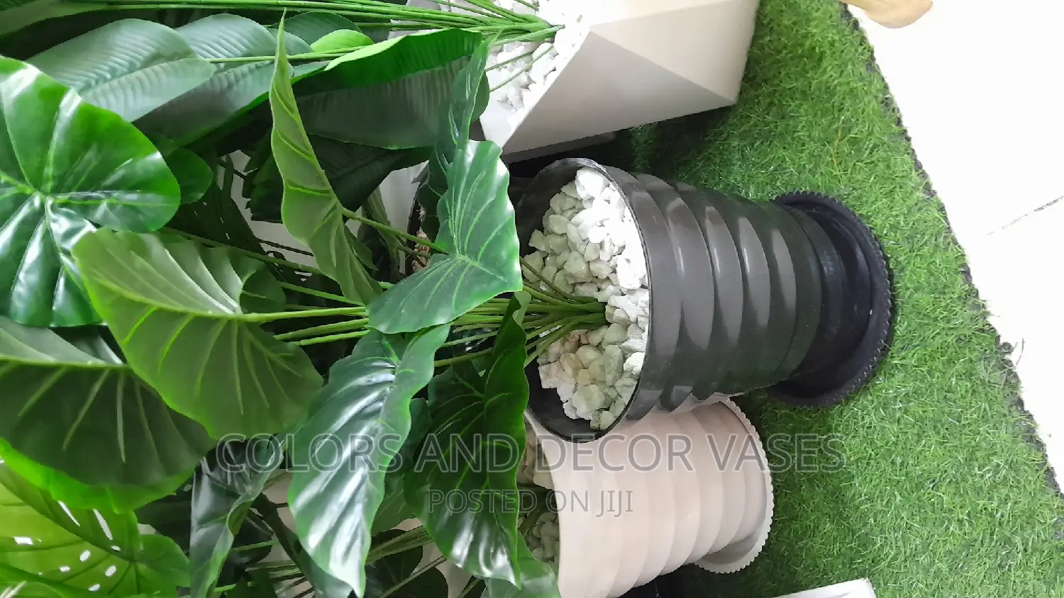 Plastic Vase, Artificial Plant and White Pebble Stones