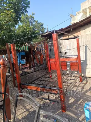 Bed 5 by 6, With Mosquito Net Stands.
