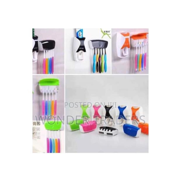 Toothpaste Dispenser+5pcs Toothbrush Holder.