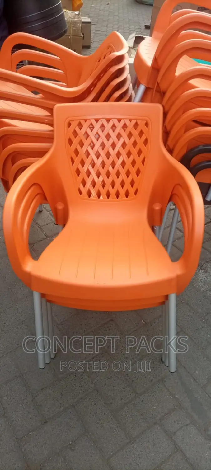 Orange Chair With Metallic Legs.