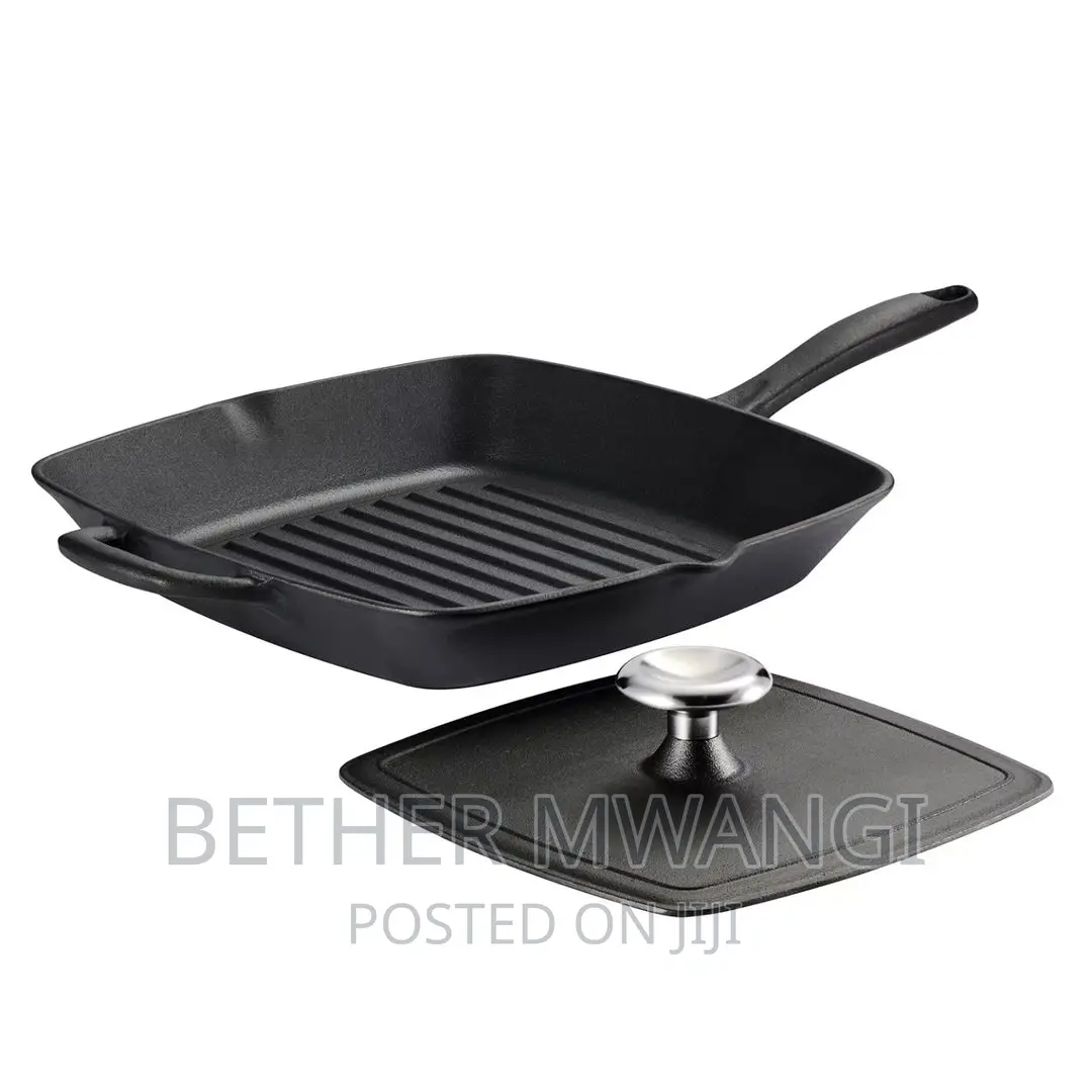 11 Inch Pre-Seasoned Cast Iron Grill With Grill Press .