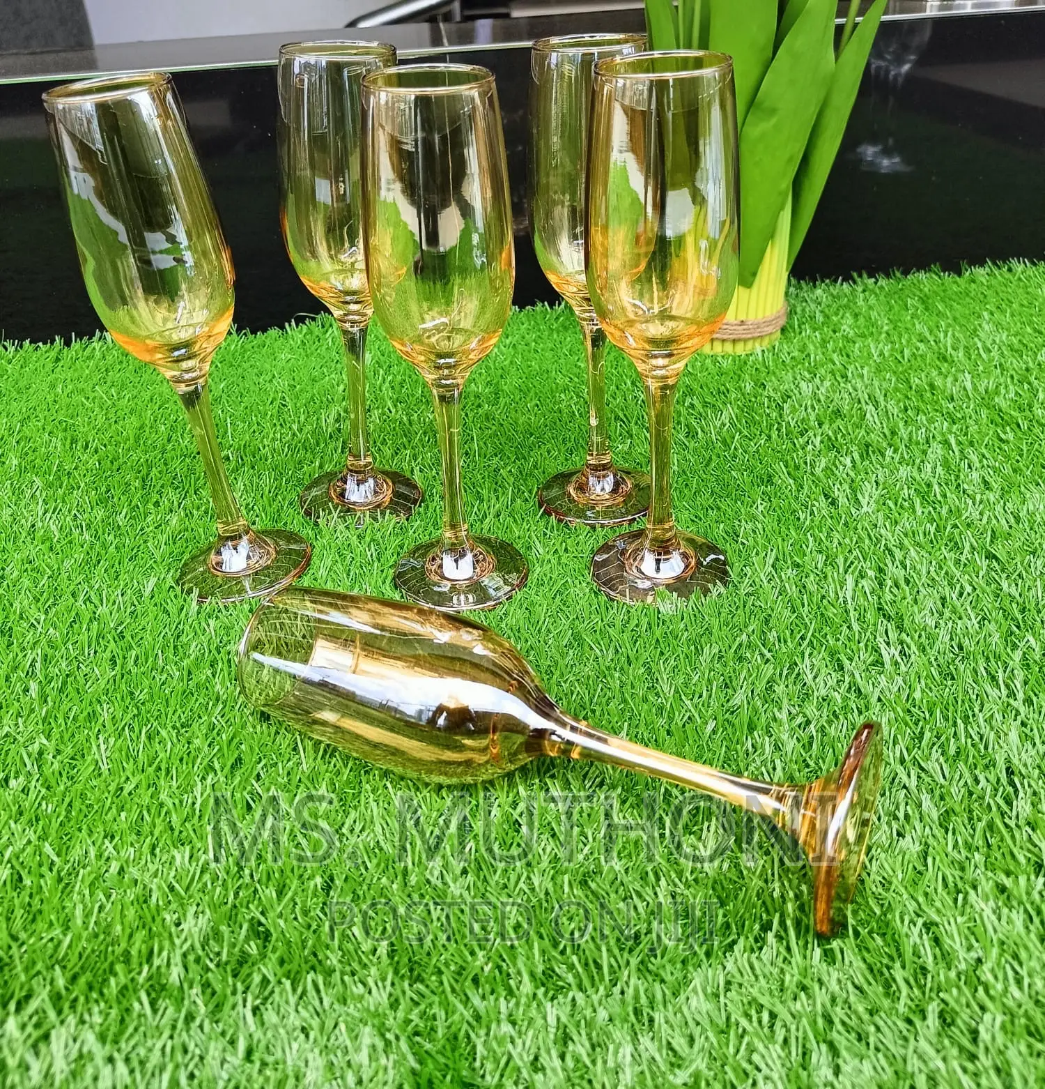 *A Set of 6 Gold Champagne Glasses*