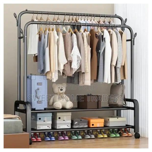 *Curved Double Clothes Rack With 2 Bottom Shelf Storage - main view