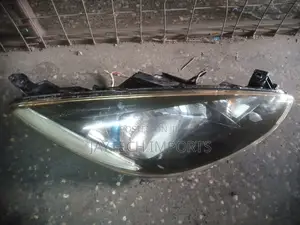 Mazda Demio RHS Headlight With Blue Ring