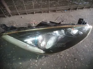Mazda Demio RHS Headlight With Blue Ring