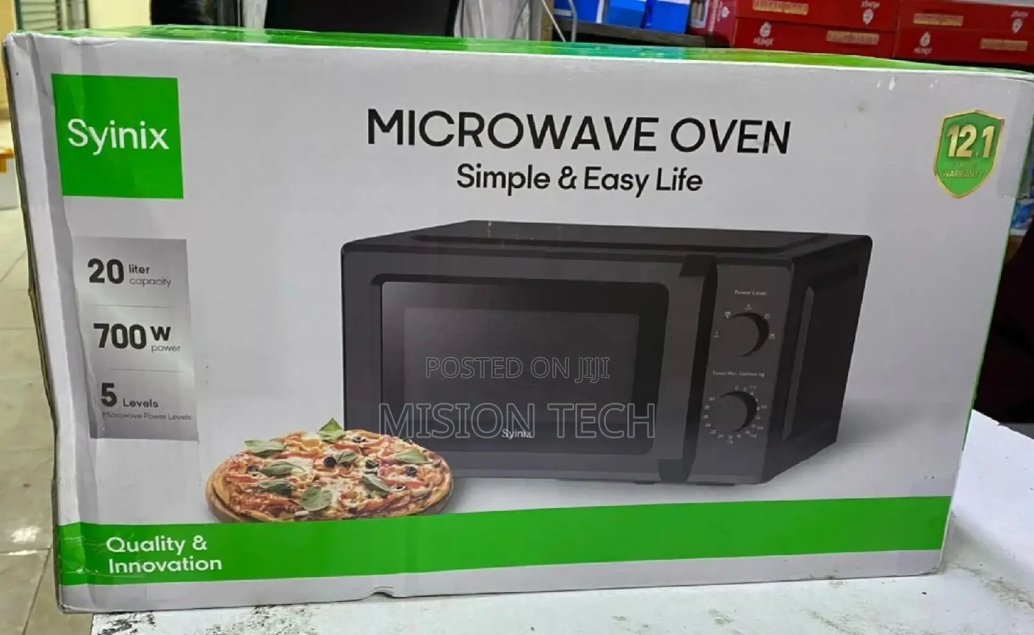 Mechanical Syinix 700 W Power Microwave Oven