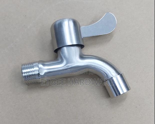 Antique Wall Tap
