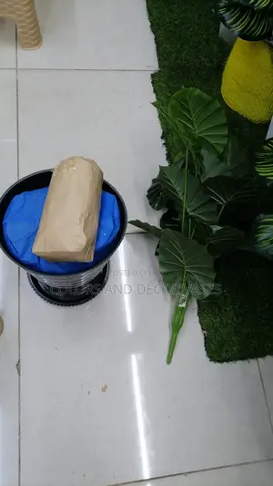 Plant,Plastic Vase and Pebble Stones