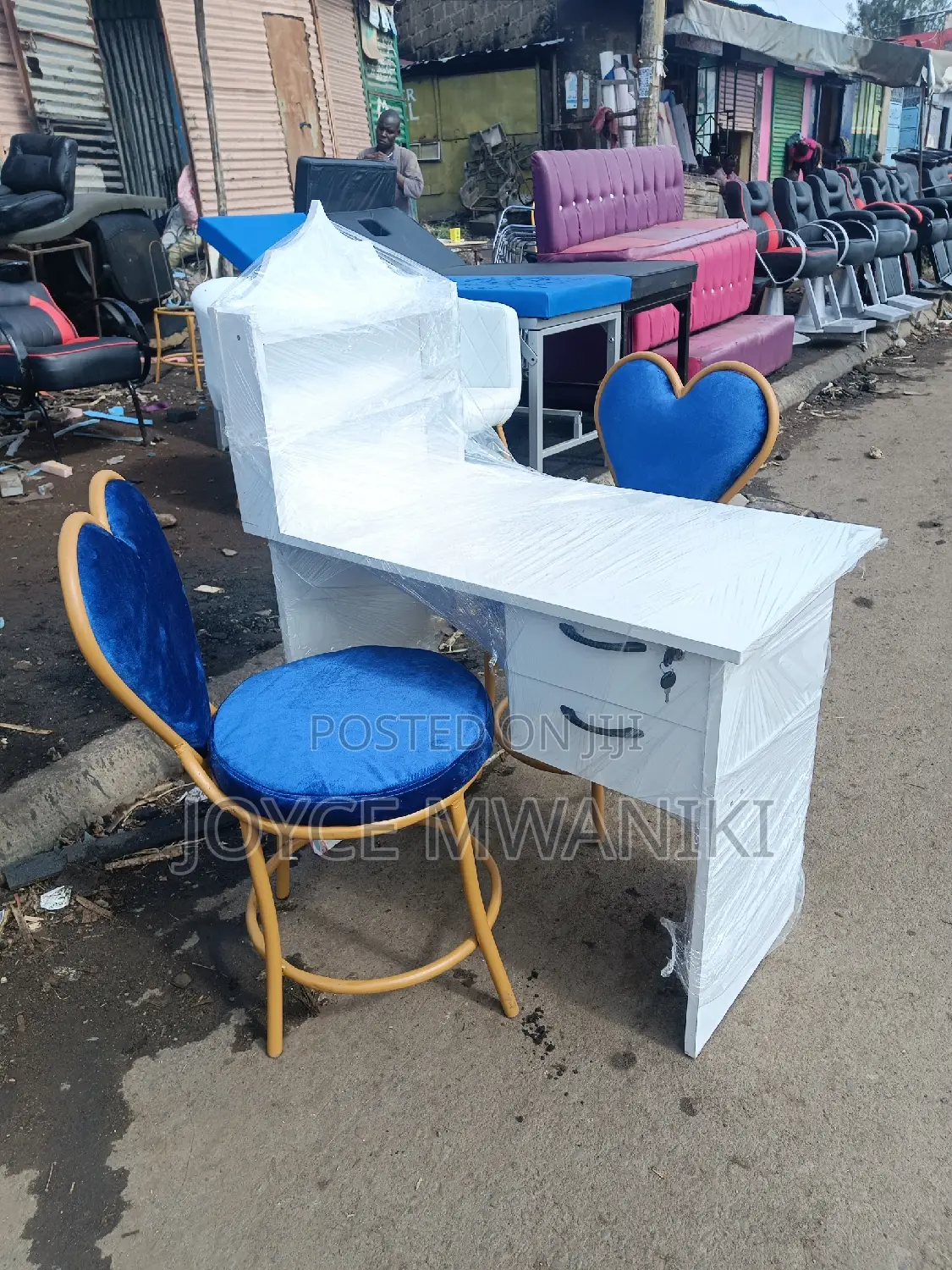 Manicure Seat, 2 Blue Love Seats and a Table.