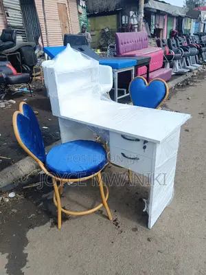 Manicure Seat, 2 Blue Love Seats and a Table.