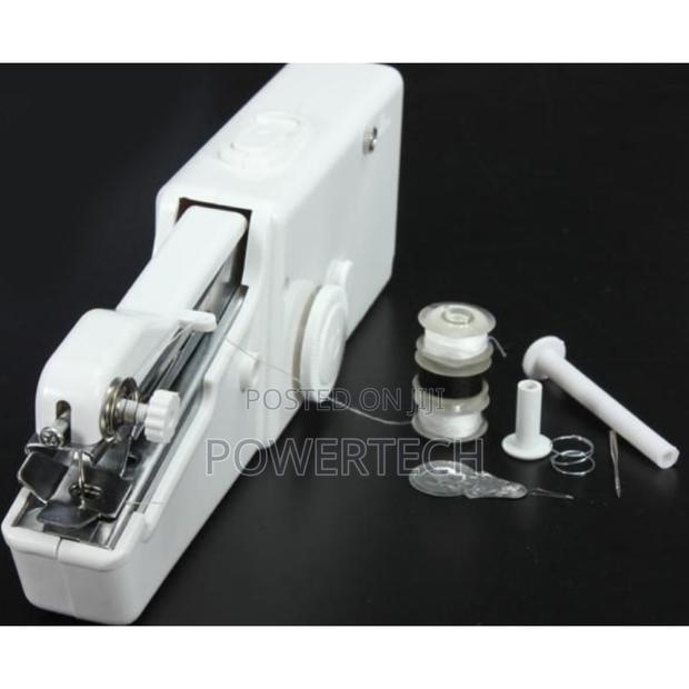 Hand Stitched Hand Held Sewing Machine - main view