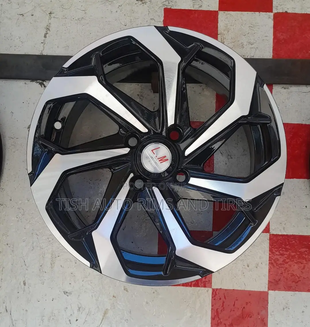 L.M Black Silver Semi Offset Rims Size 14