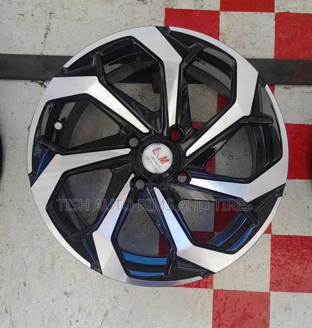 L.M Black Silver Semi Offset Rims Size 14