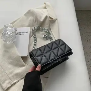 Mini Quilted Flap Chain Sling Bag