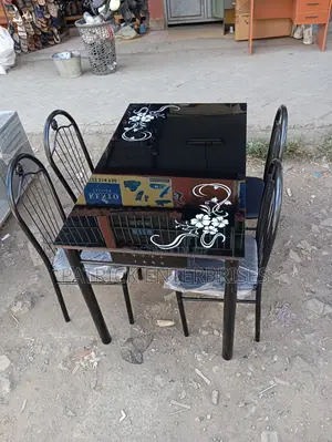 Imported Morden Dinning Table 4 Seater Top Glass