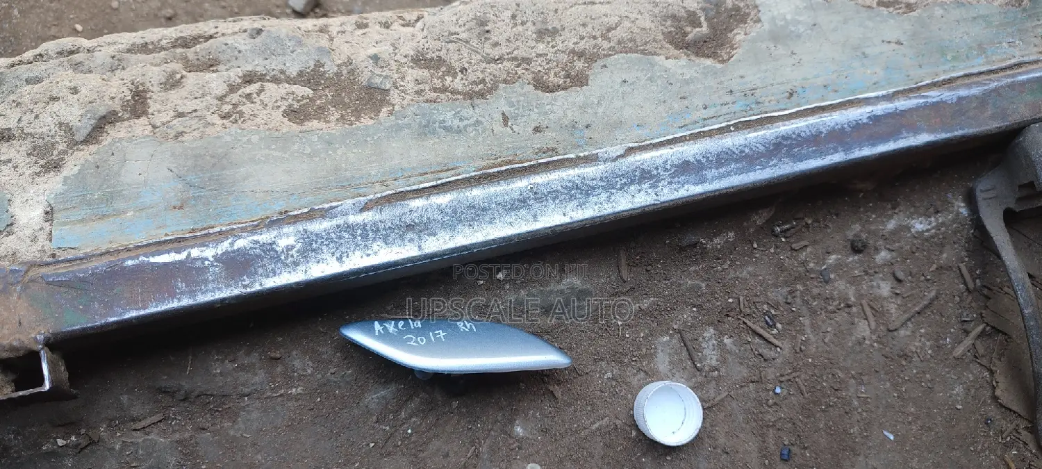 Madza Axela Headlight Washer Jet Cover