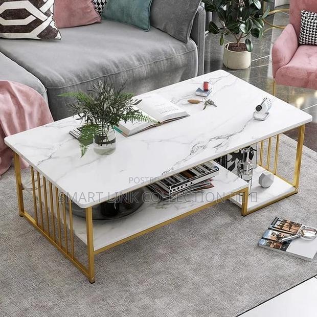 * 
Marble Effect Glass Top Table
