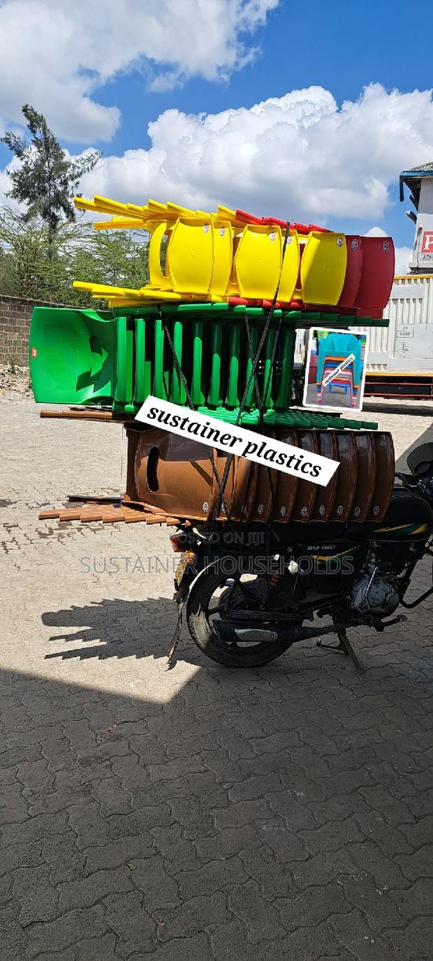 Assorted Acme Armless Plastic Chairs Available - main view