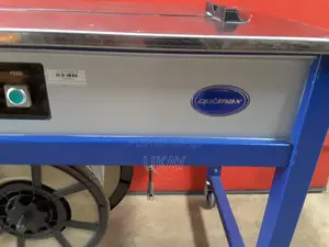 Optimax Open Frame Semi Automatic Table Strapper.