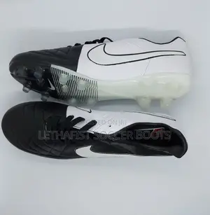 white nike tiempo football boots