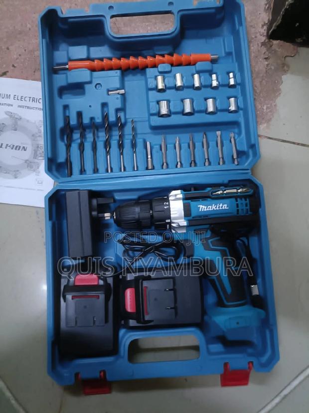 Makita Cordless Drill/ Electric Makita Drill Set - main view