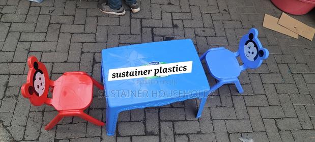 Blue and Red Plastic Chairs and Table Set - main view