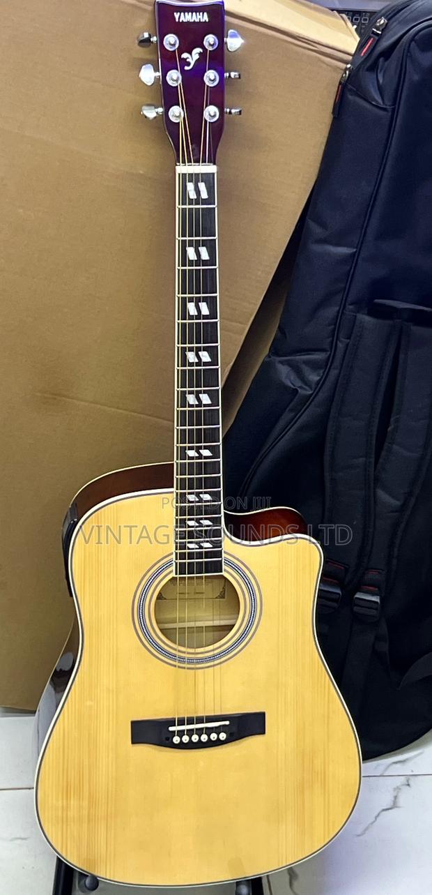 Original Yamaha Semi Acoustic Box Guitar With Heavy Gig Bag