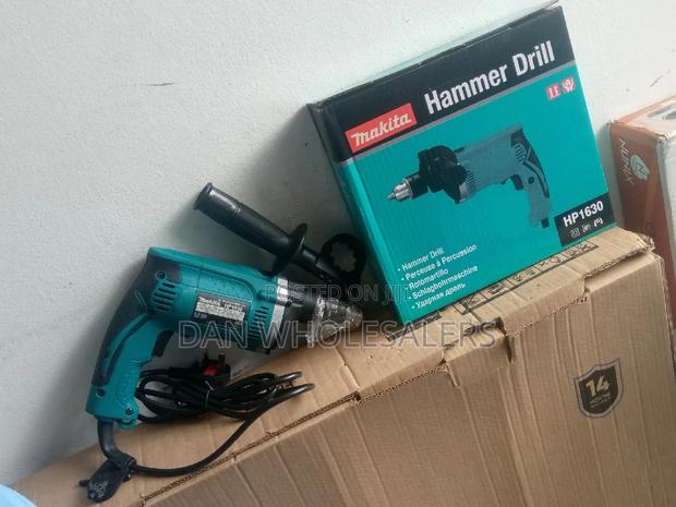 710 Watts Hammer Drill Makita