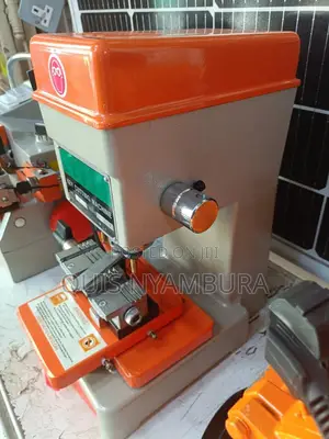 Key Cutter Key Cutting Machine .