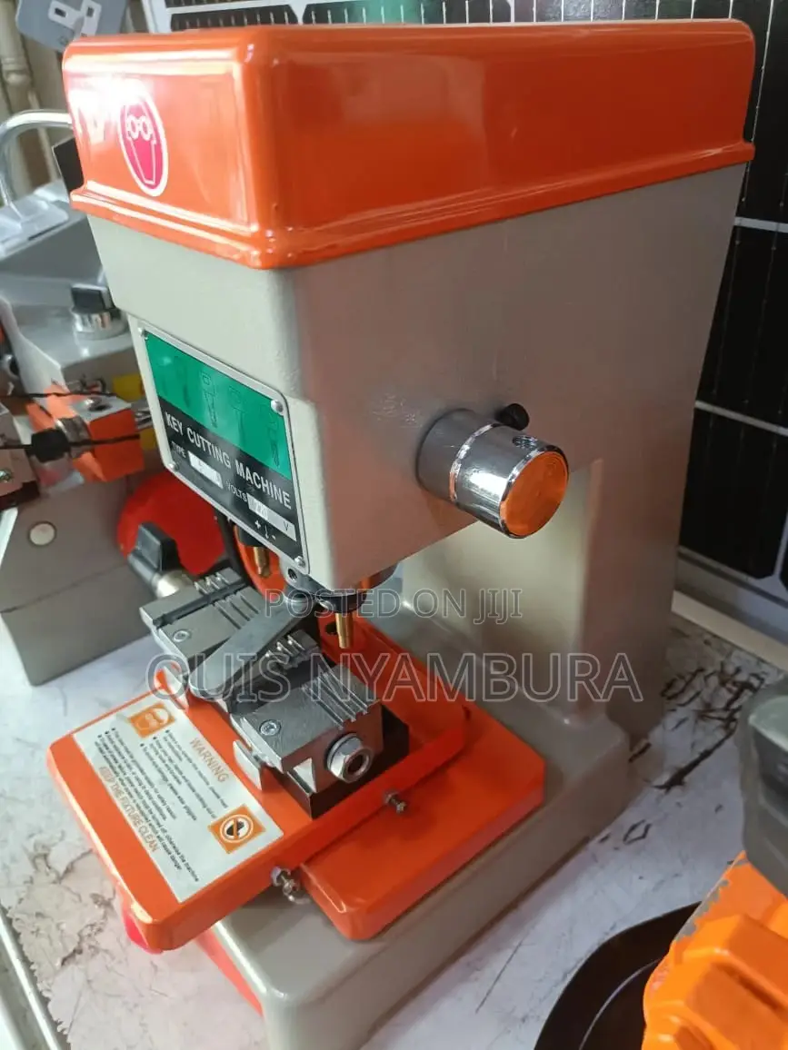 Key Cutter Key Cutting Machine .