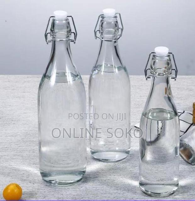 Beverage Glass Bottle With Flip Clip Swing Lock Top - main view
