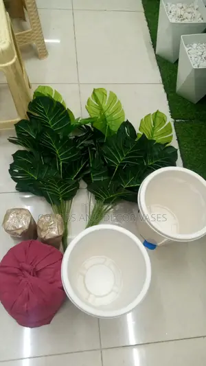 Artificial Plants and Vases With Pebble Stones