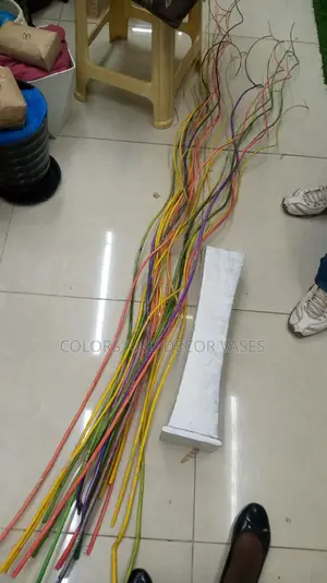 Colored Sticks 1.5m With Wooden Vase KSH 2000.