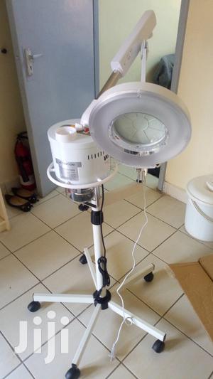 Facial With Magnifying Glass - thumbnail 2