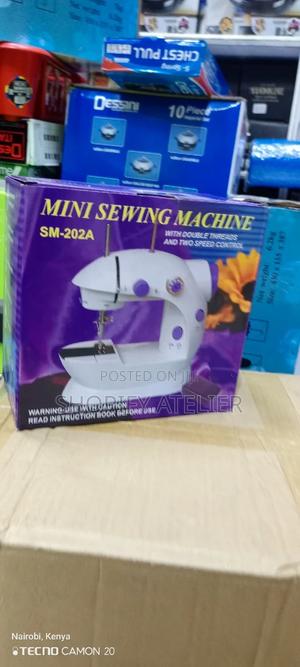 Mini Hand Held Sewing Machine - thumbnail 2