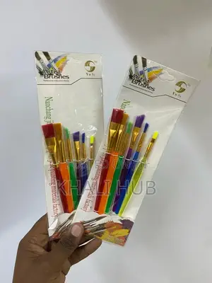 Different Sized Glowing Artistic Paint Brushes