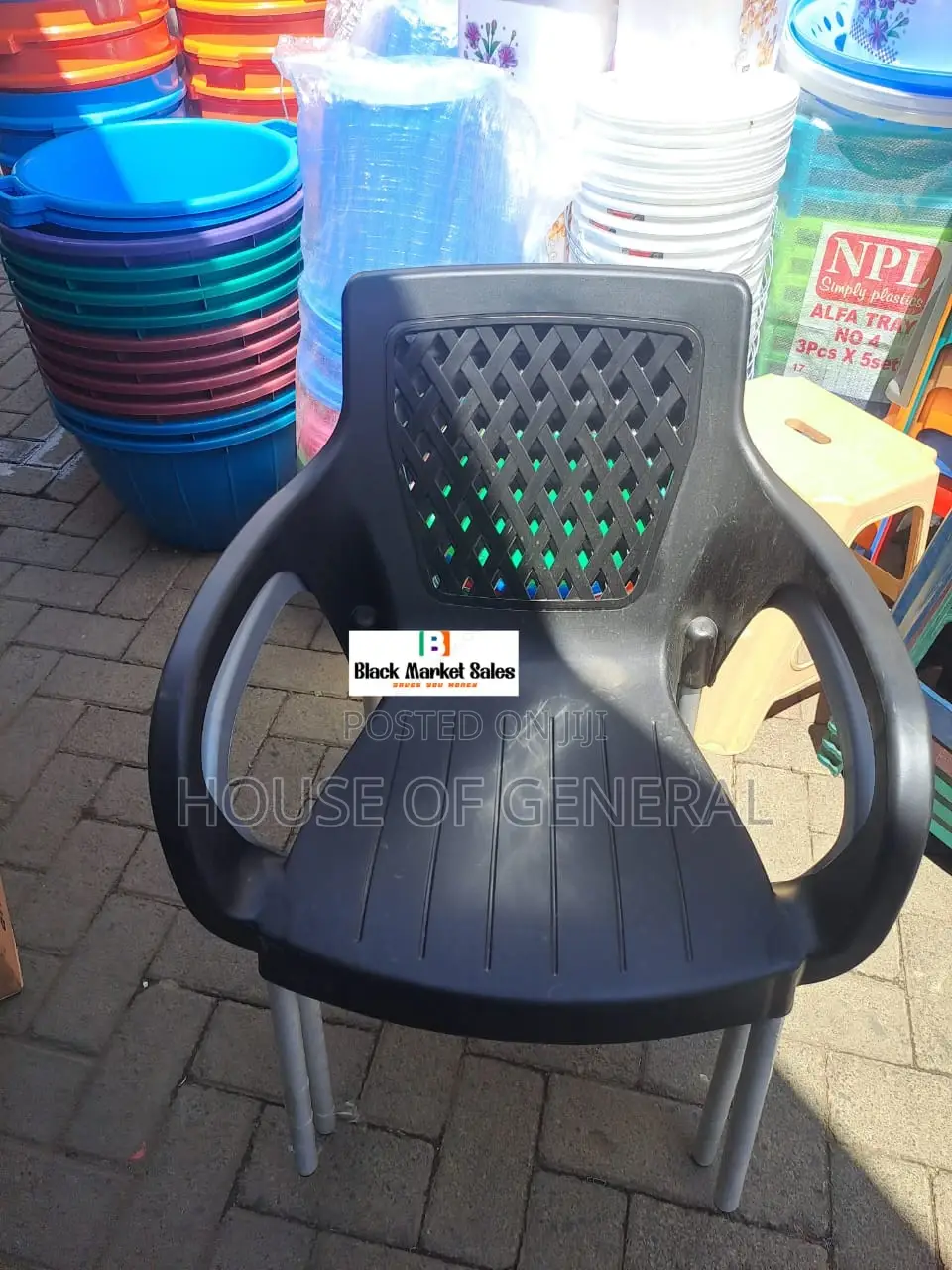 Black Plastic Chair With Metal Tubing