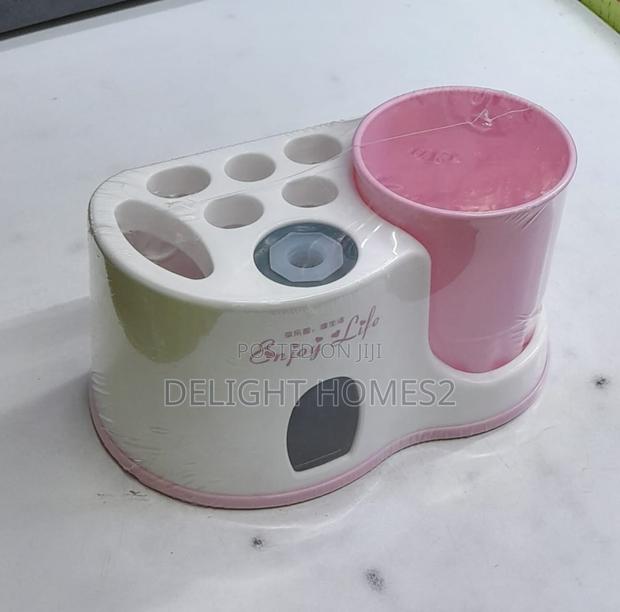 Toothbrush Holder With Toothpaste Dispenser