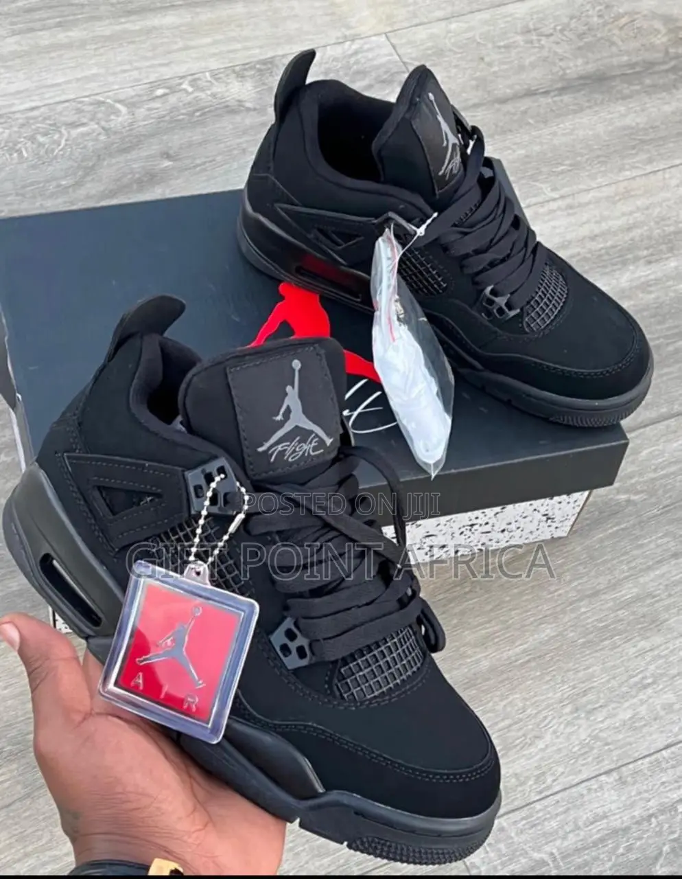 Air Jordan 4 Sneakers Unisex Black In Color